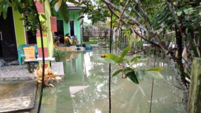 Rumah warga yang terendam banjir di Dusun Dua, Kabupaten Kuansing, Selasa (21/3/2023).
