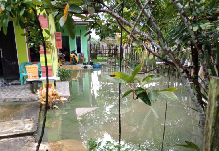Rumah warga yang terendam banjir di Dusun Dua, Kabupaten Kuansing, Selasa (21/3/2023).