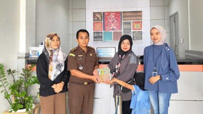 Penyerahan uang pengganti kasus korupsi ke kas negara melalui Bank BRI.