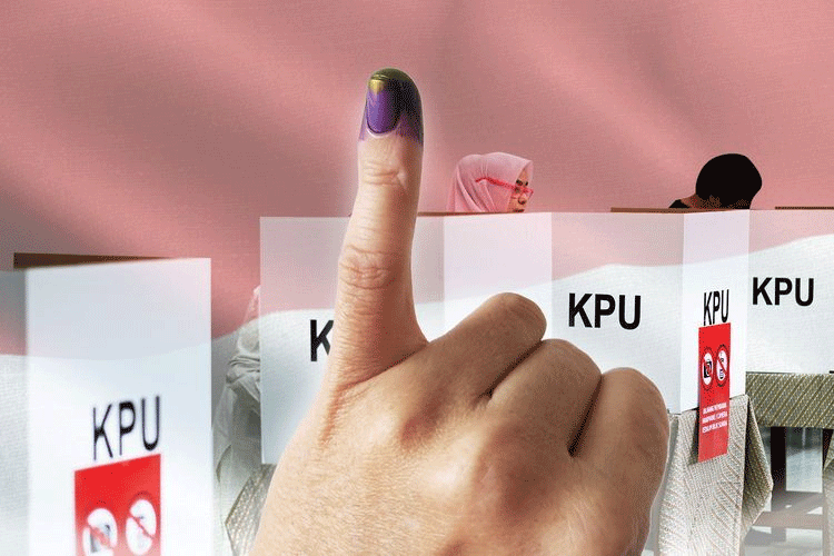 Jari dicelupkan ke tinta sebagai tanda telah ikut memilih di pemilu. (kompas.com)
