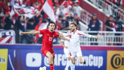 Nathan kuasai bola saat laga Indonesia dengan Yordania. (pssi)