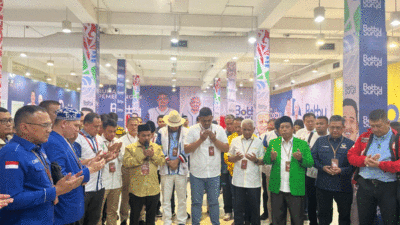 Booby-Surya bersama tim pemenangan dan relawan