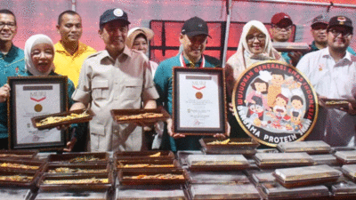 Pemerintah Kabupaten Kampar kembali meraih rekor Museum Rekor Indonesia (MURI) dengan makanan 1.373 Porsi Gulai Ikan Salai Patin, Minggu (2/2/2025).