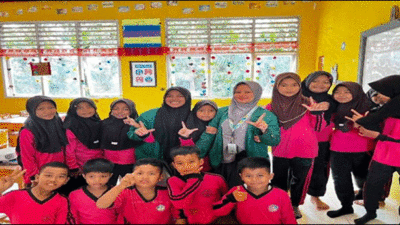 Foto bersama usai edukasi pada murid SD.