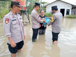 Desa Pekan Kebanjiran, Polsek Tanjung Beringin Salurkan Bantuan