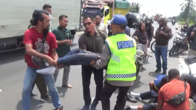 Dua Pelajar SMP Luka Serius Usai Tabrak Truk Parkir di Jalinsum Sergai, Sopir Sempat Kabur