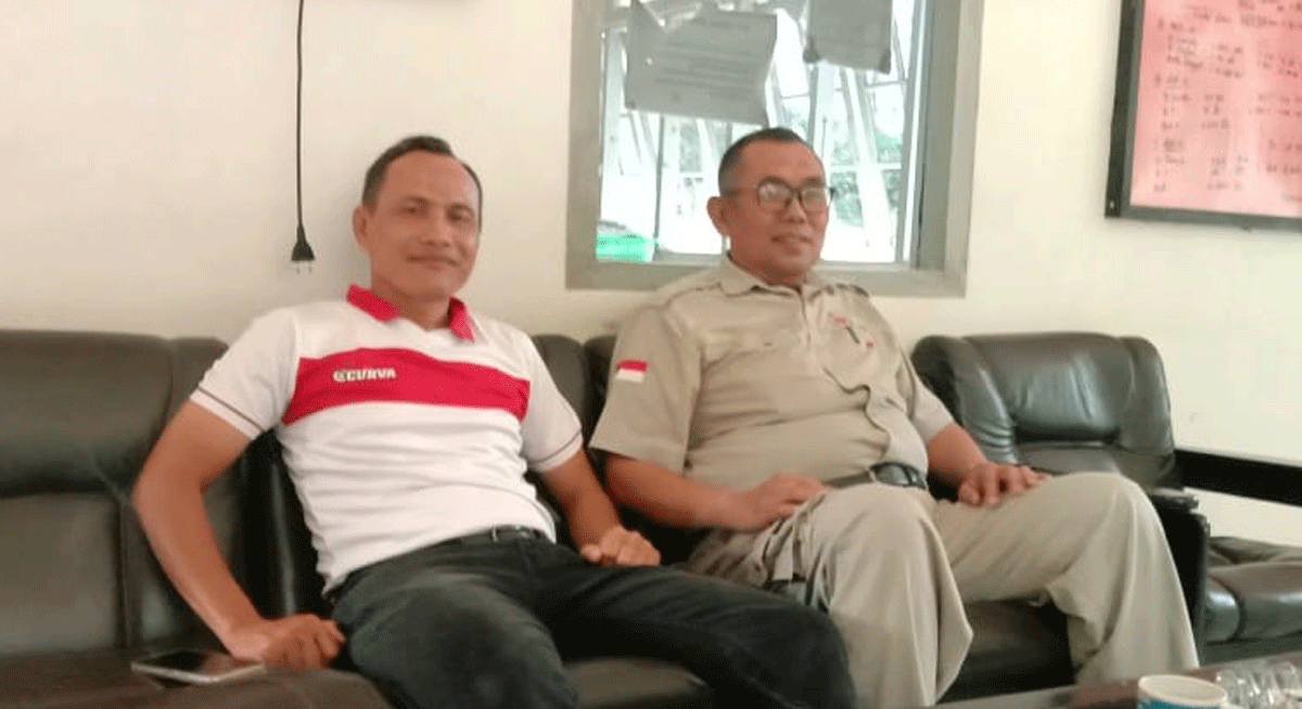 Senior manager dan asisten kebun