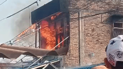 Sebuah ruko terbakar di Tanjung Beringin, Sumatera Utara.