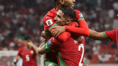 Pemain Maroko selebrasi usai cetak gol.