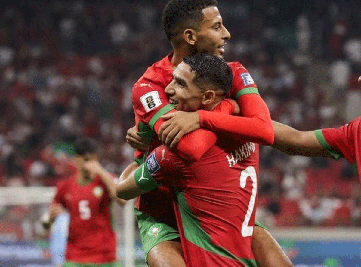 Pemain Maroko selebrasi usai cetak gol.