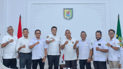 Wabup Sergai H. Adlin Tambunan bersama para pengurus NPCI Sergai usai melaksanakan audiensi di ruang kerjanya, Rabu (2/9/2026).